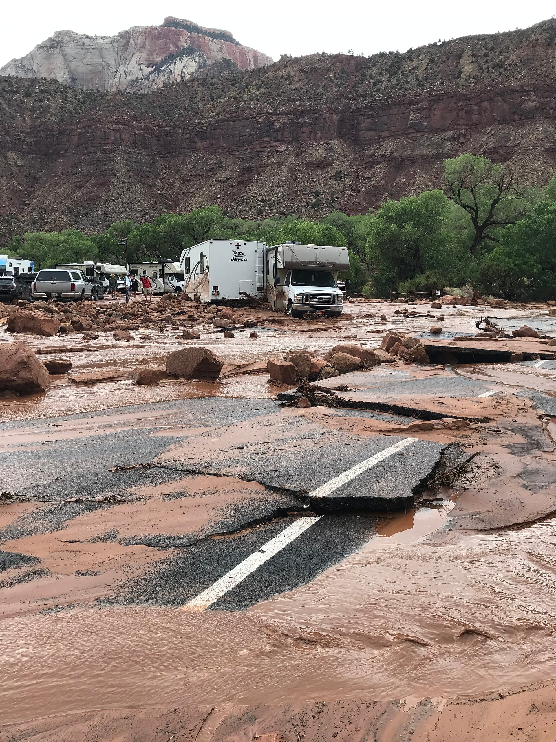 Damaged parking lot at Zion National Park South Entrance after a 2021 flash flood closed the road.