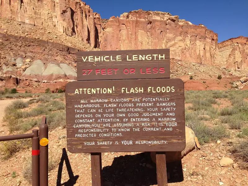 Flash flood danger sign at the entrance to Grand Wash on Capitol Reef Scenic Drive, Utah.