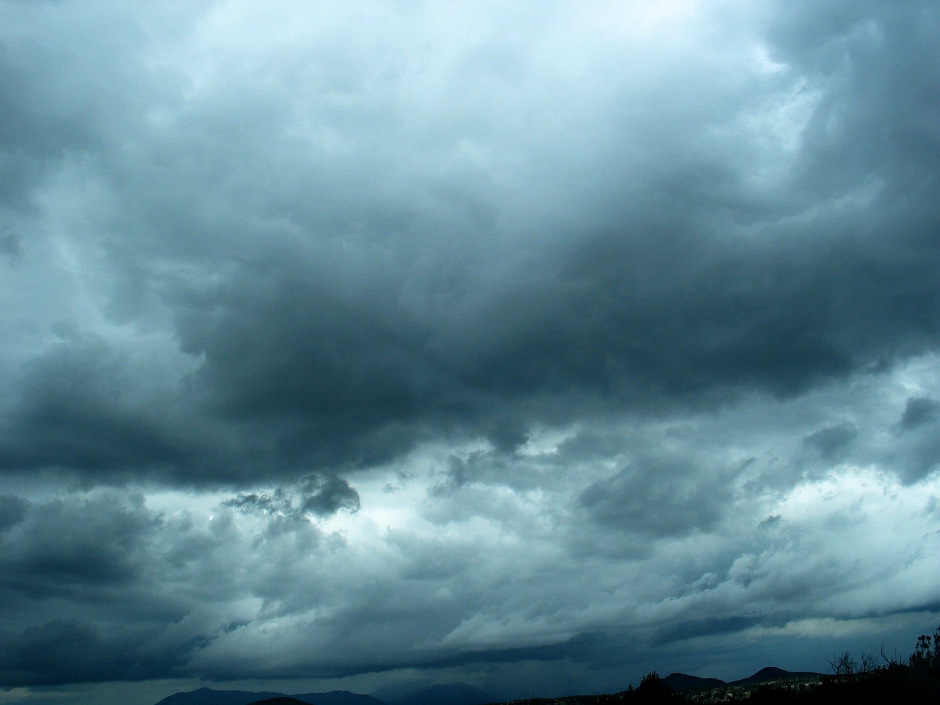 Monsoon storm clouds building over Flagstaff, Arizona, in late afternoon.