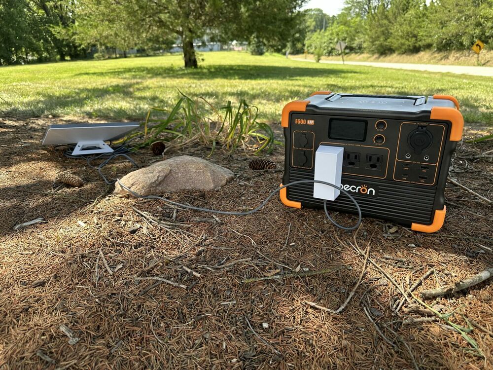 The Mini next to a portable power station - what 500 Wh of battery looks like for off-grid internet.