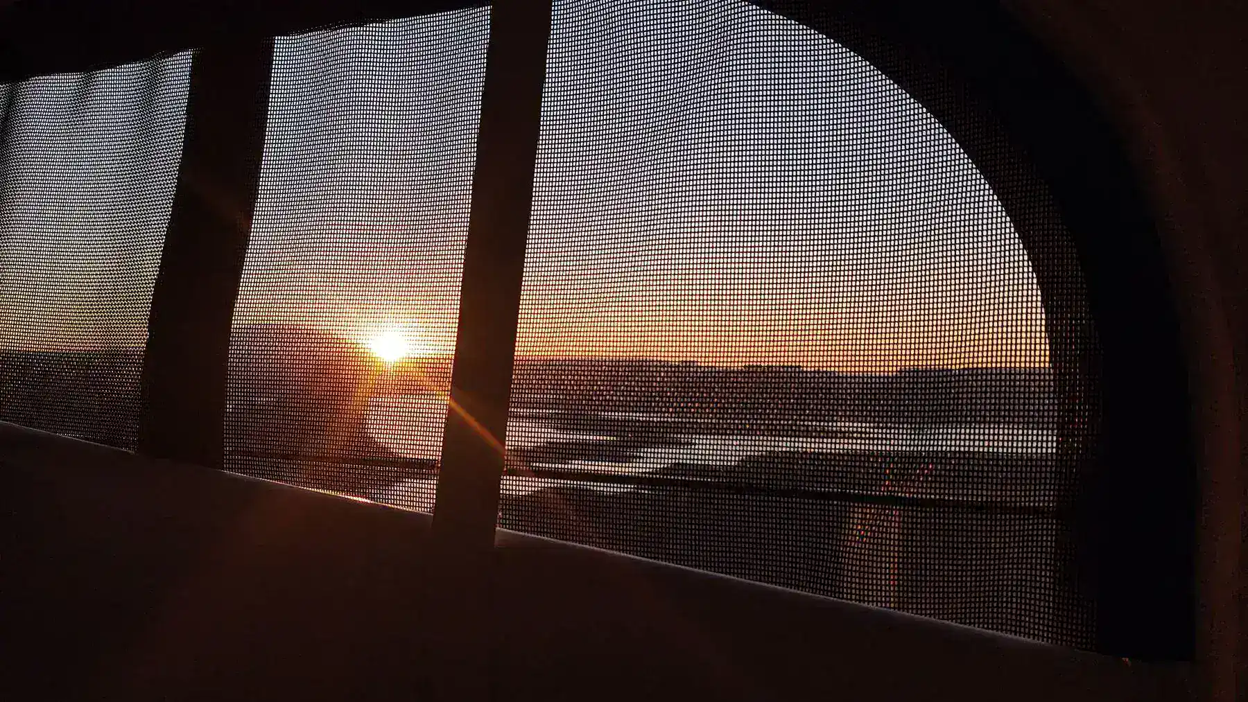 Sunrise viewed from inside the EarthCruiser
